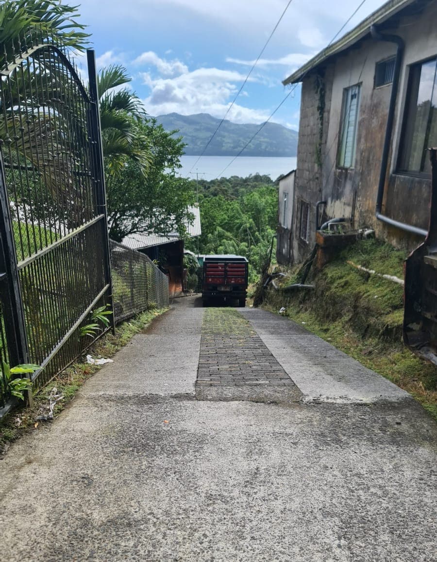 Modest, 4 Bedroom 2 Bathroom house Lake View in Nuevo Arenal